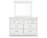Cama King tapizada con paneles Kanwyn, tocador, espejo y cómoda