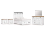 Cama Ashbryn King con paneles, tocador, espejo y dos mesitas de noche