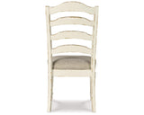 Realyn Dining Table with 8 Chairs