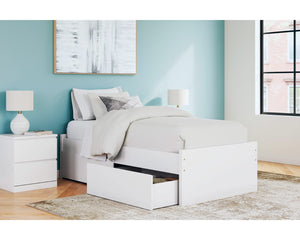 Cama individual con plataforma Onita y espacio de almacenamiento en un lateral