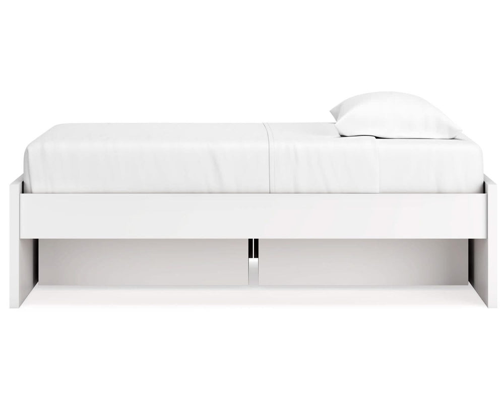 Cama individual con plataforma Onita y espacio de almacenamiento en un lateral