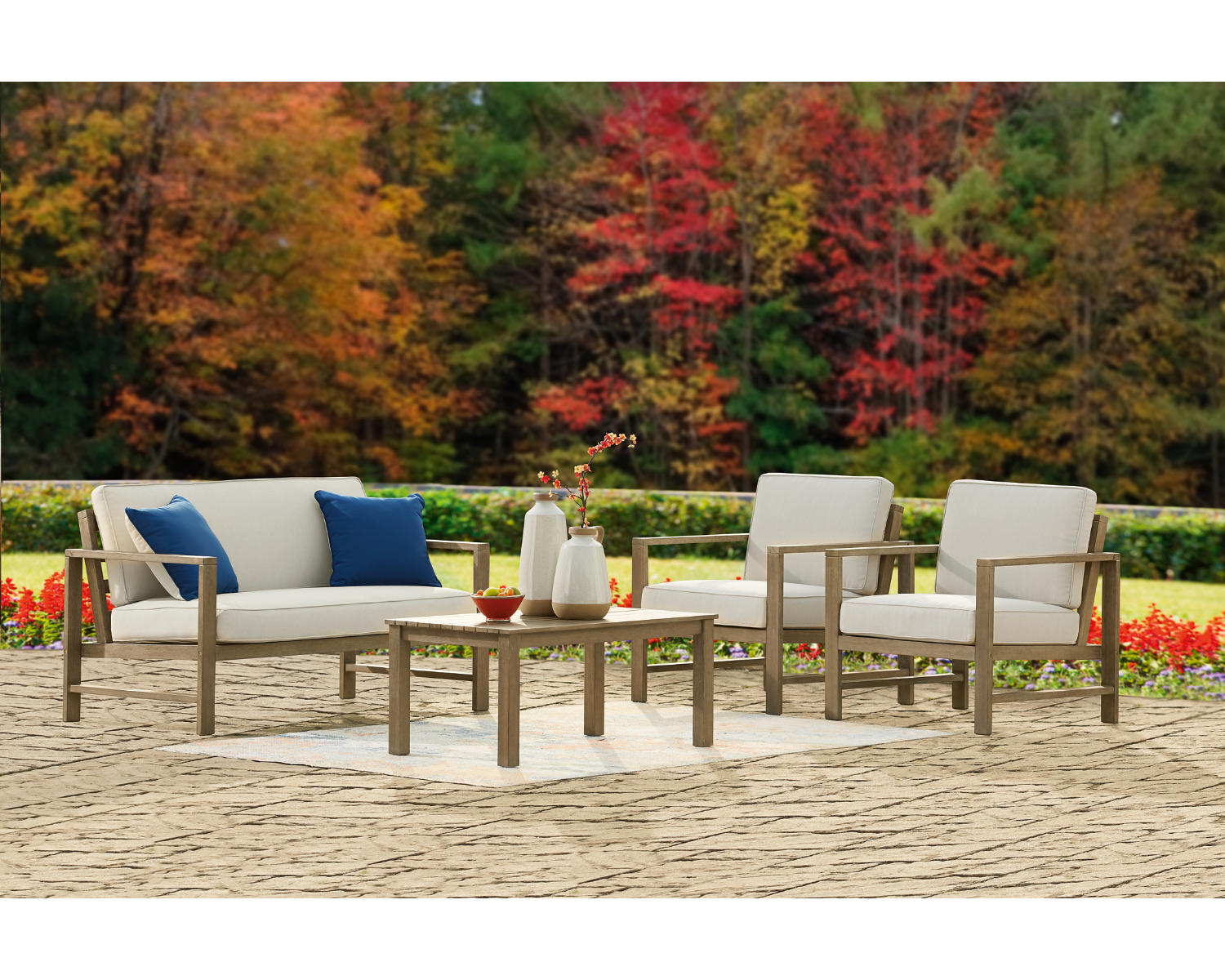 Fynnegan Outdoor Loveseat, 2 Lounge Chairs and Coffee Table