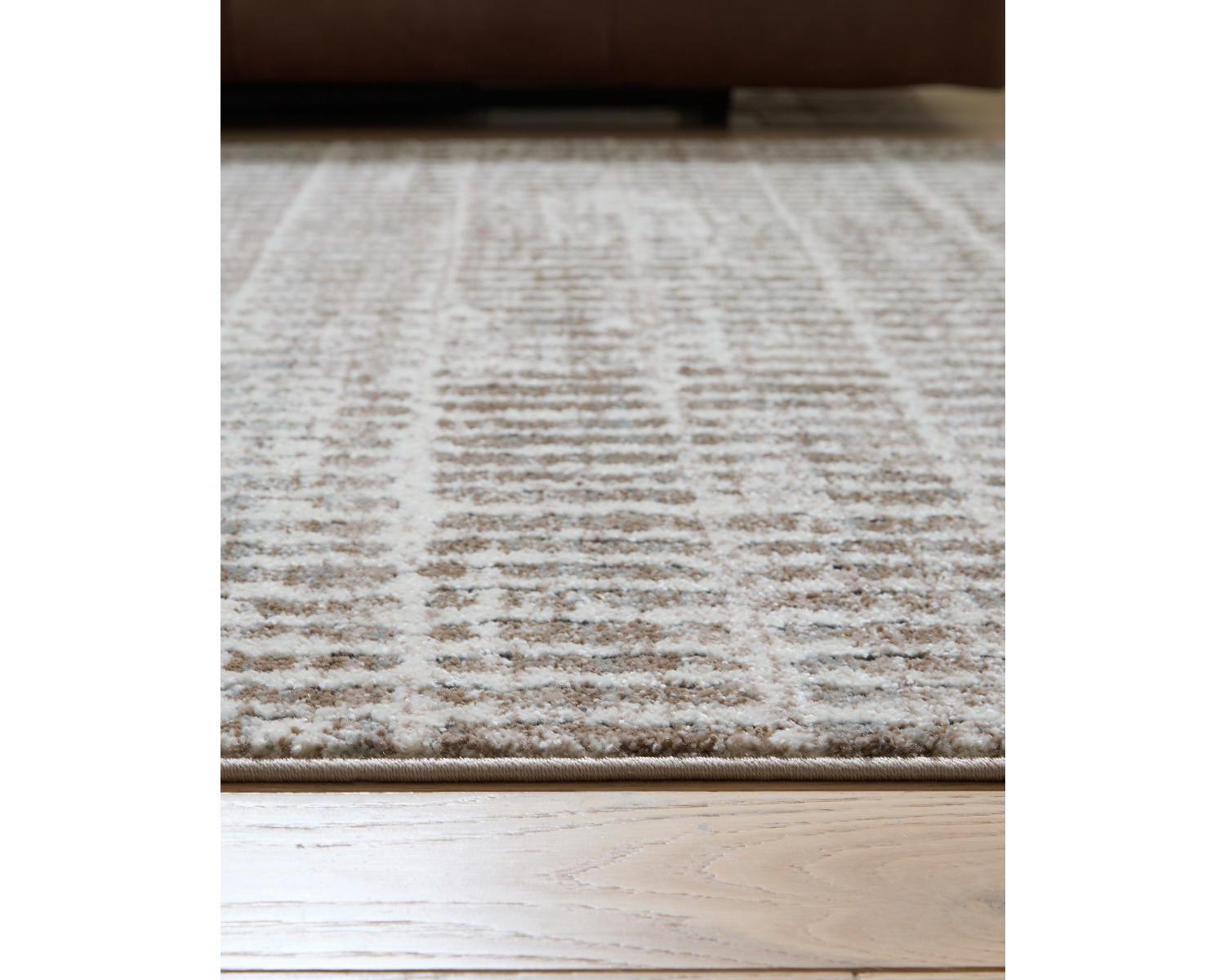 Fuadwick 7'10" x 10' Area Rug