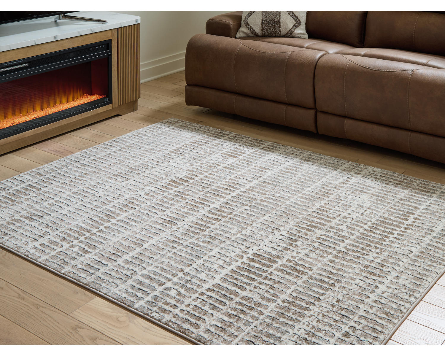 Fuadwick 5'3" x 7' Area Rug