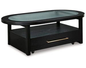 Mesa de centro Winbardi y dos mesas auxiliares junto a la silla