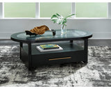Mesa de centro Winbardi y dos mesas auxiliares junto a la silla
