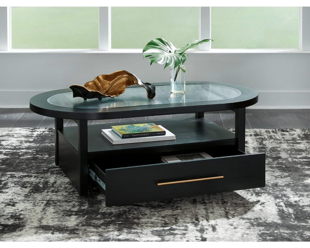 Mesa de centro Winbardi y dos mesas auxiliares junto a la silla