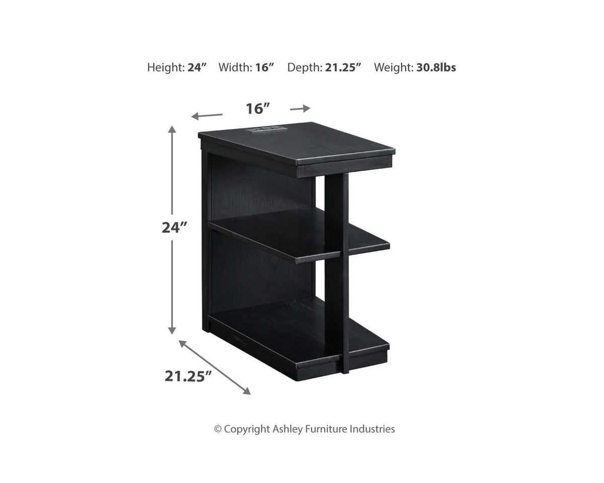 Mesa de centro Winbardi y dos mesas auxiliares junto a la silla