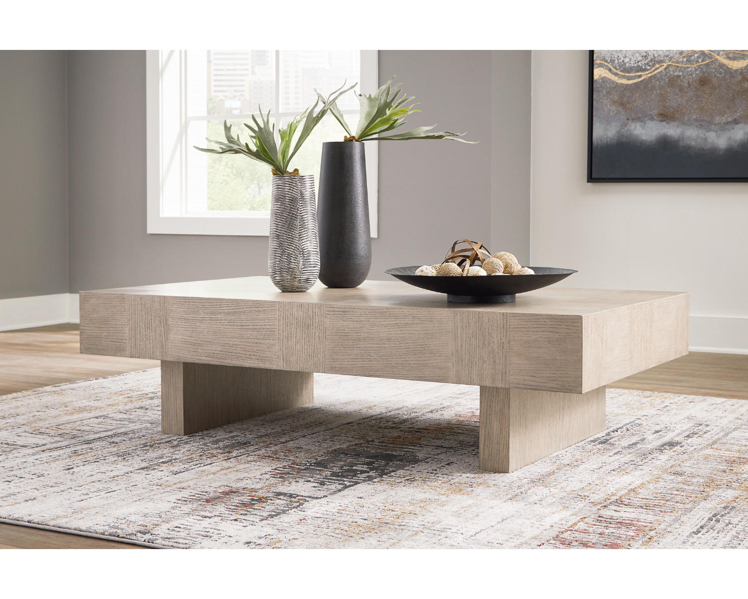 Jorlaina Coffee Table and 2 End Tables
