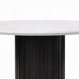 Mesa de comedor redonda Jaramillo con cubierta de mármol artificial